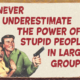 Never Underestimate Stupid-People Tin-Sign